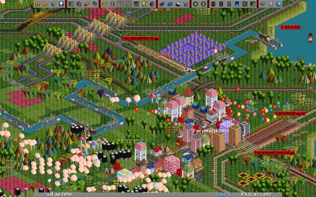 OpenTTD toyland town with canals, a railway station and bridges