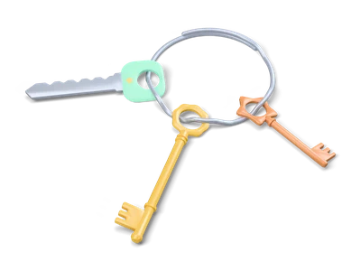 Steel key ring with a brass key, a flat key with mint head and a small copper star key lying on a table