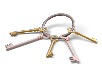 Dark iron ring with five old fashioned keys in gold and rusty pink metal fanned out on the floor