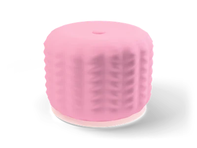 Round pink knitted pouf with chunky ribbed texture and a button in the middle of the top